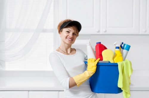 Professional cleaner preparing a room in the SE13 area