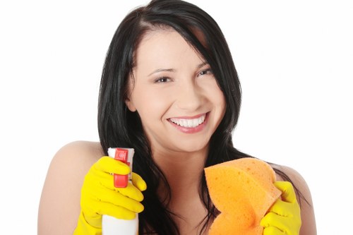 Technician handling carpet cleaning chemicals safely indoors